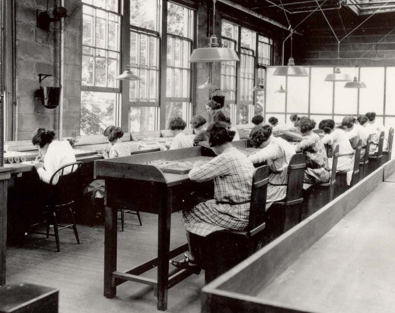 Radium Girls at work, highlighting their dangerous environment