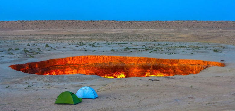 Tourists visiting the Darvaza Crater