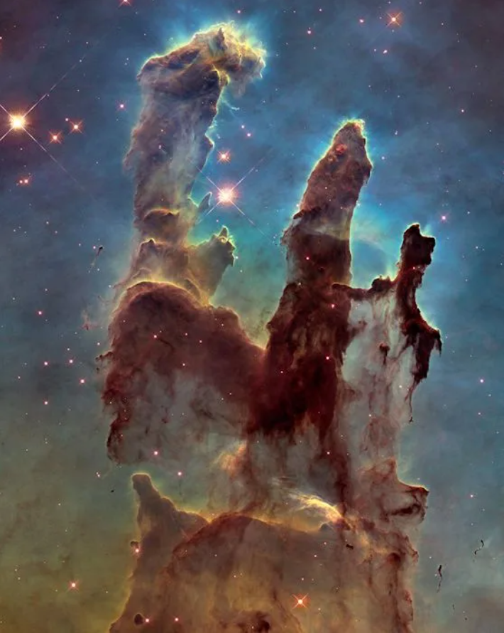 Hubble's 2015 view of the Eagle Nebula showcasing stellar activity.