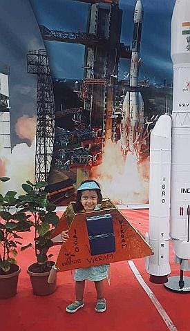 A child in India celebrates the Chandrayaan-2 launch