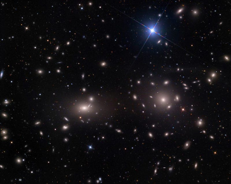 Coma Cluster's central galaxies indicating dark matter presence